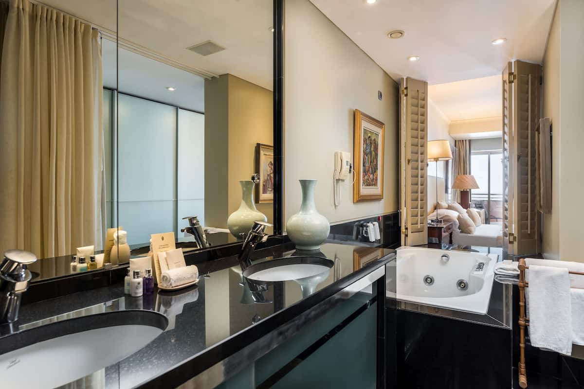 penthouse rooftop suite | bathroom | separate bathtub and shower, hair dryer, bathrobes, bidet