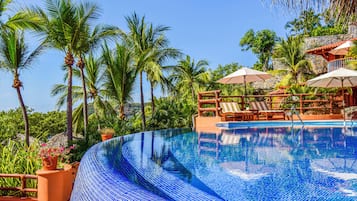 2 outdoor pools, pool umbrellas, sun loungers