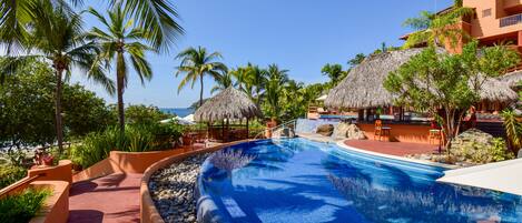 2 outdoor pools, pool umbrellas, pool loungers