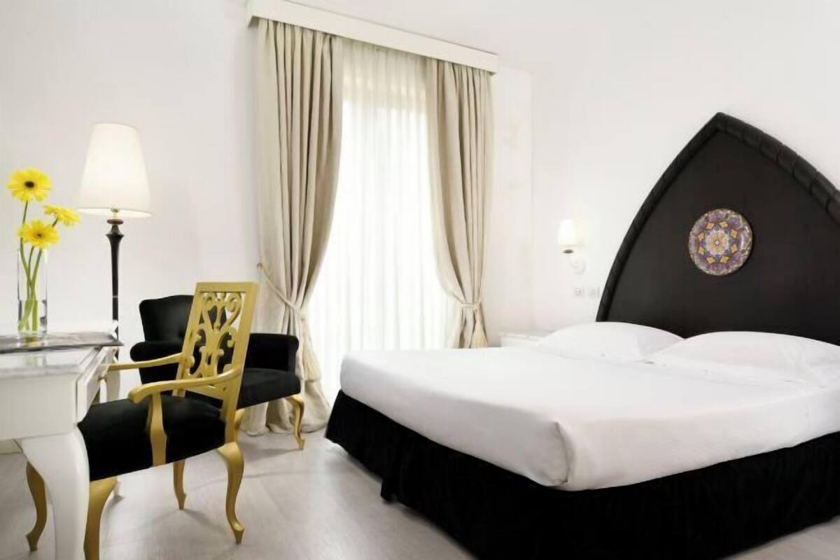 Premium bedding, down duvets, minibar, in-room safe