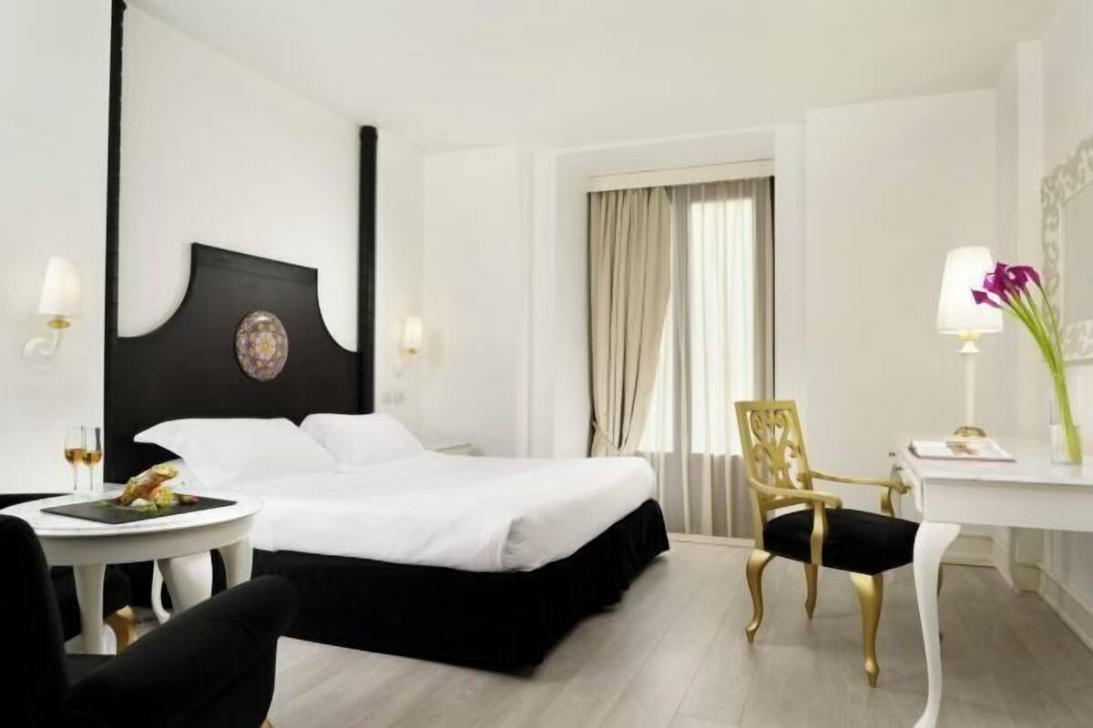 Premium bedding, down duvets, minibar, in-room safe