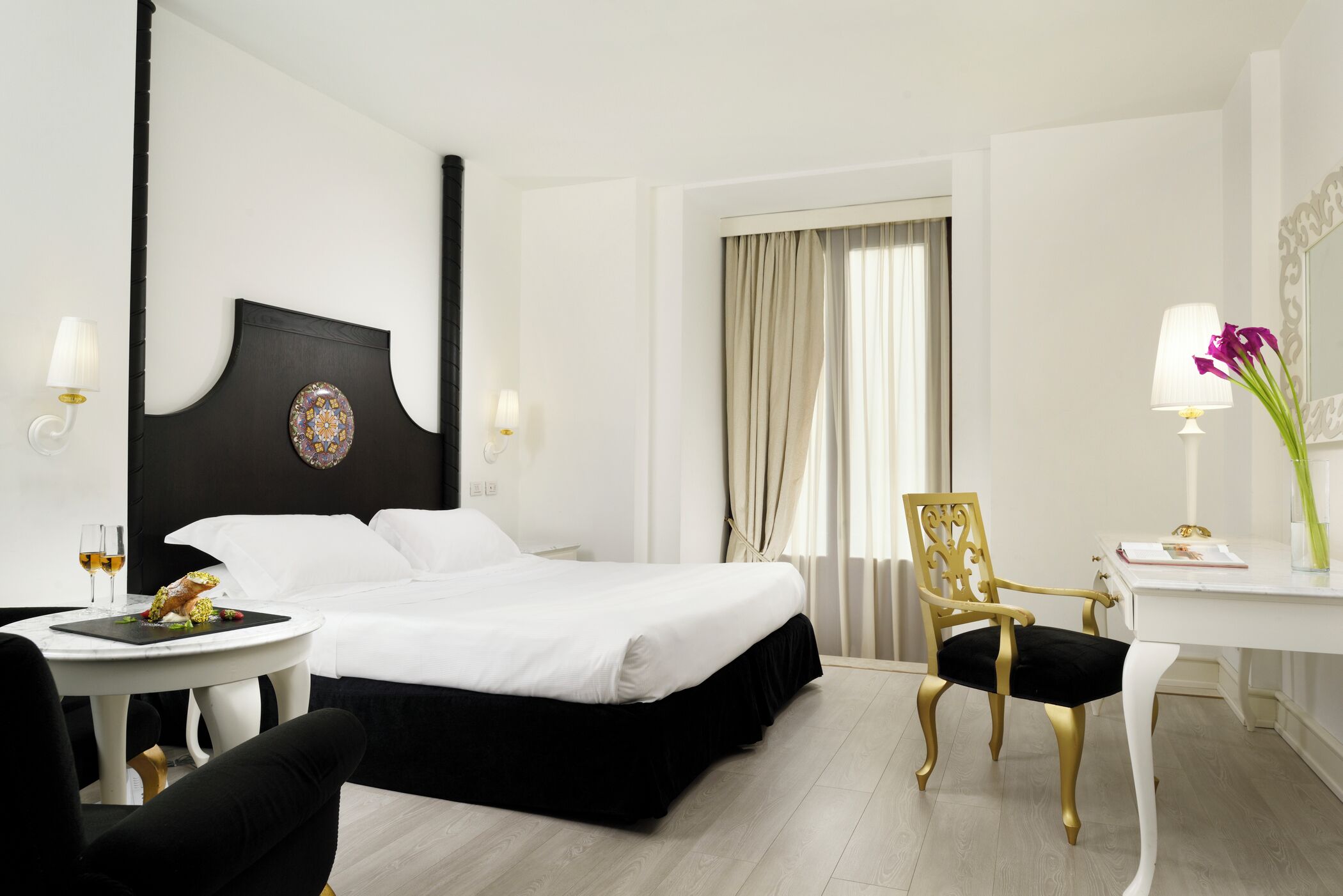 Premium bedding, down comforters, minibar, in-room safe