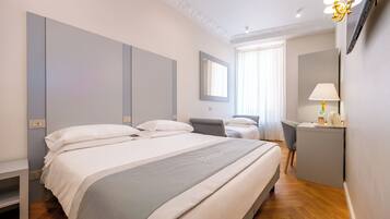Triple Room | Down comforters, minibar, in-room safe, desk