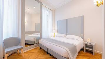 Triple Room | Down comforters, minibar, in-room safe, desk