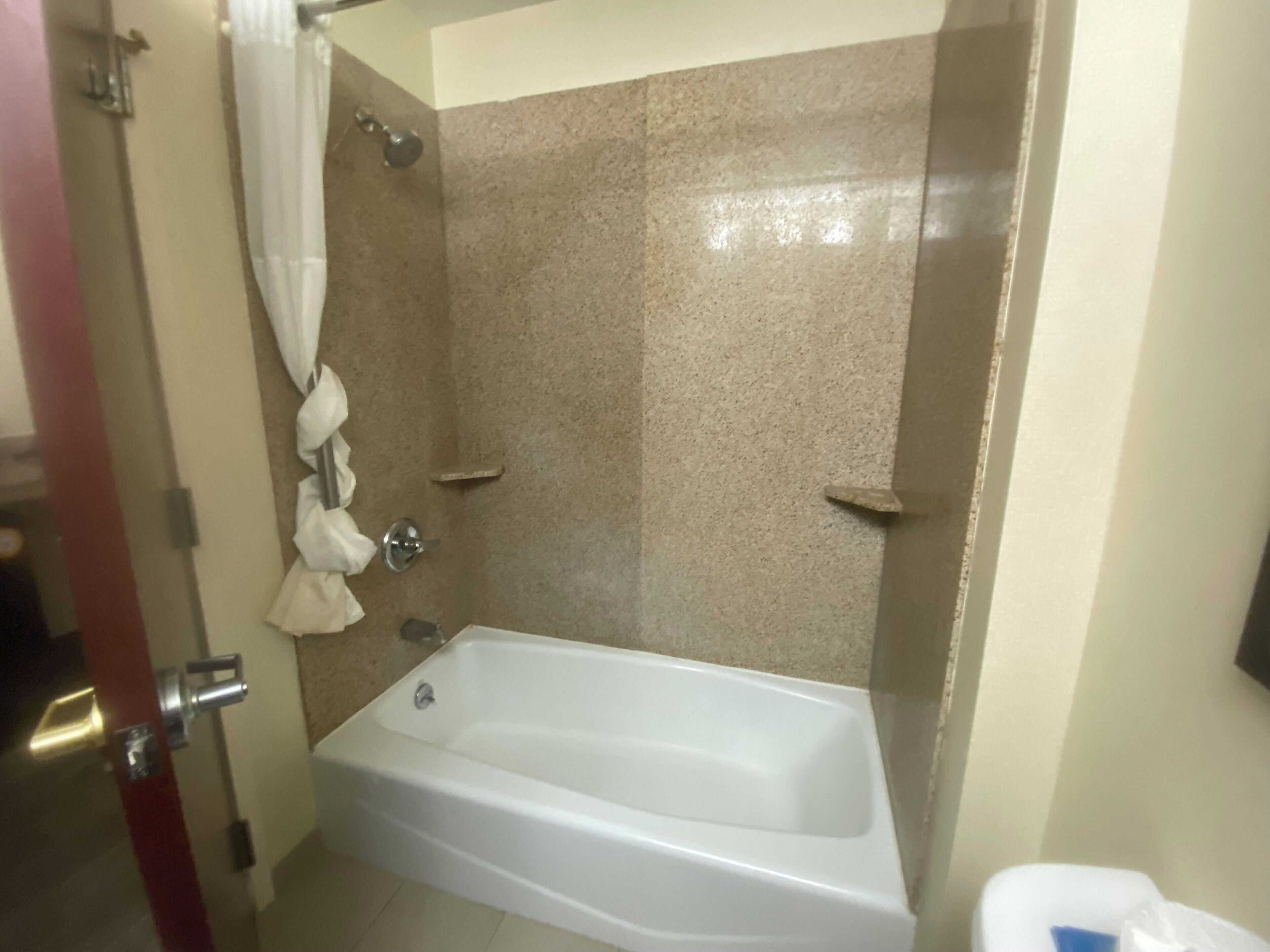 combined shower/bathtub, eco-friendly toiletries, hair dryer, towels