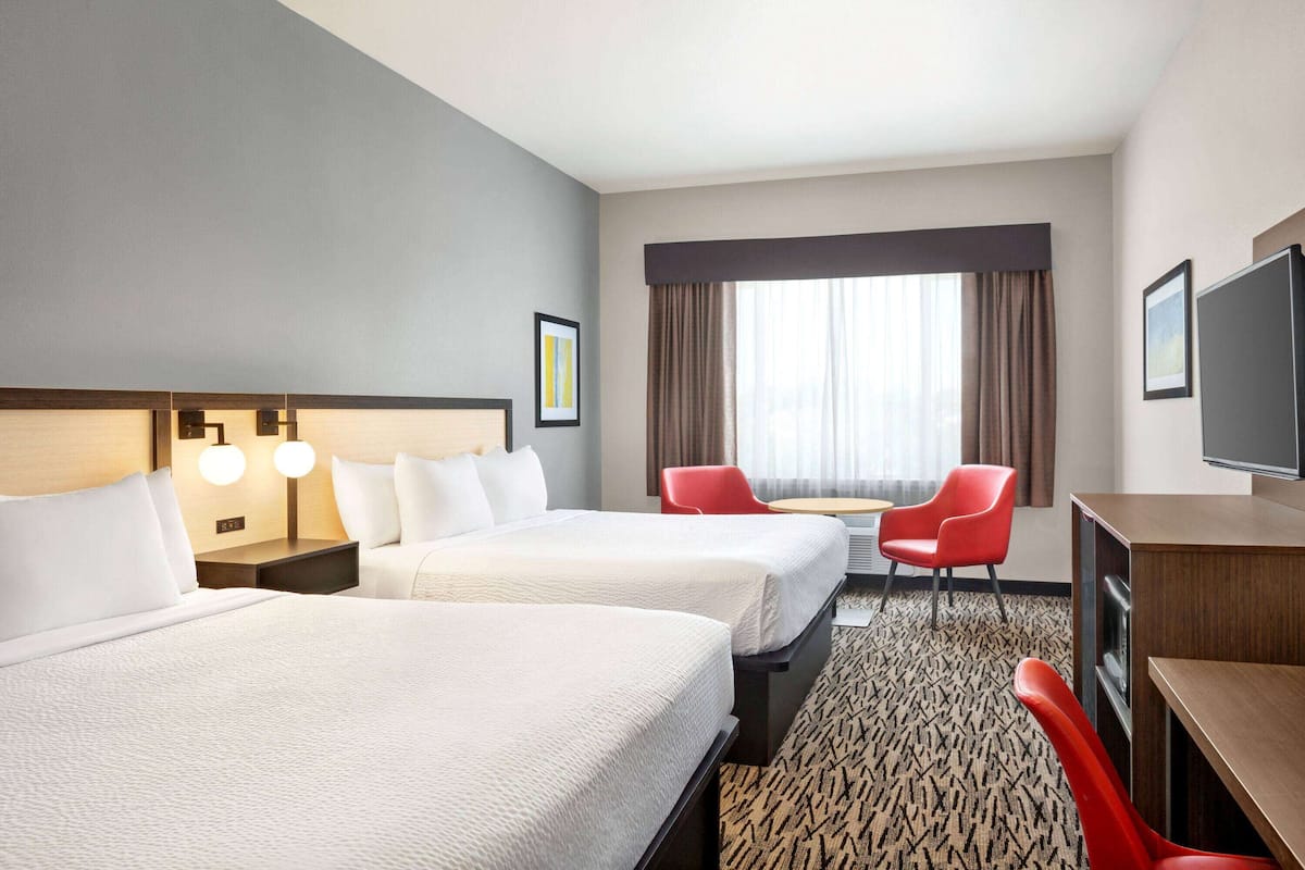 Room, 2 King Beds, Non Smoking | In-room safe, desk, laptop workspace, blackout drapes