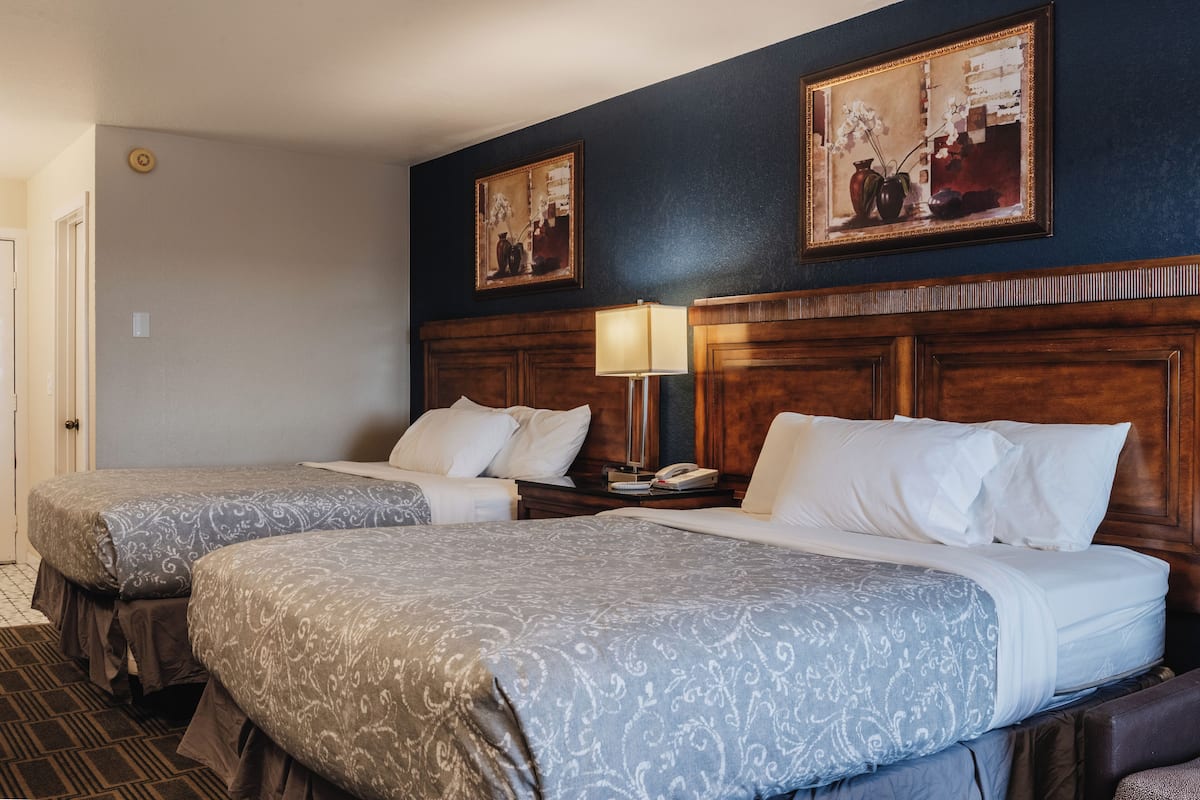 Deluxe Room, 2 Queen Beds, Balcony, Beach View | Desk, free WiFi, bed sheets, alarm clocks