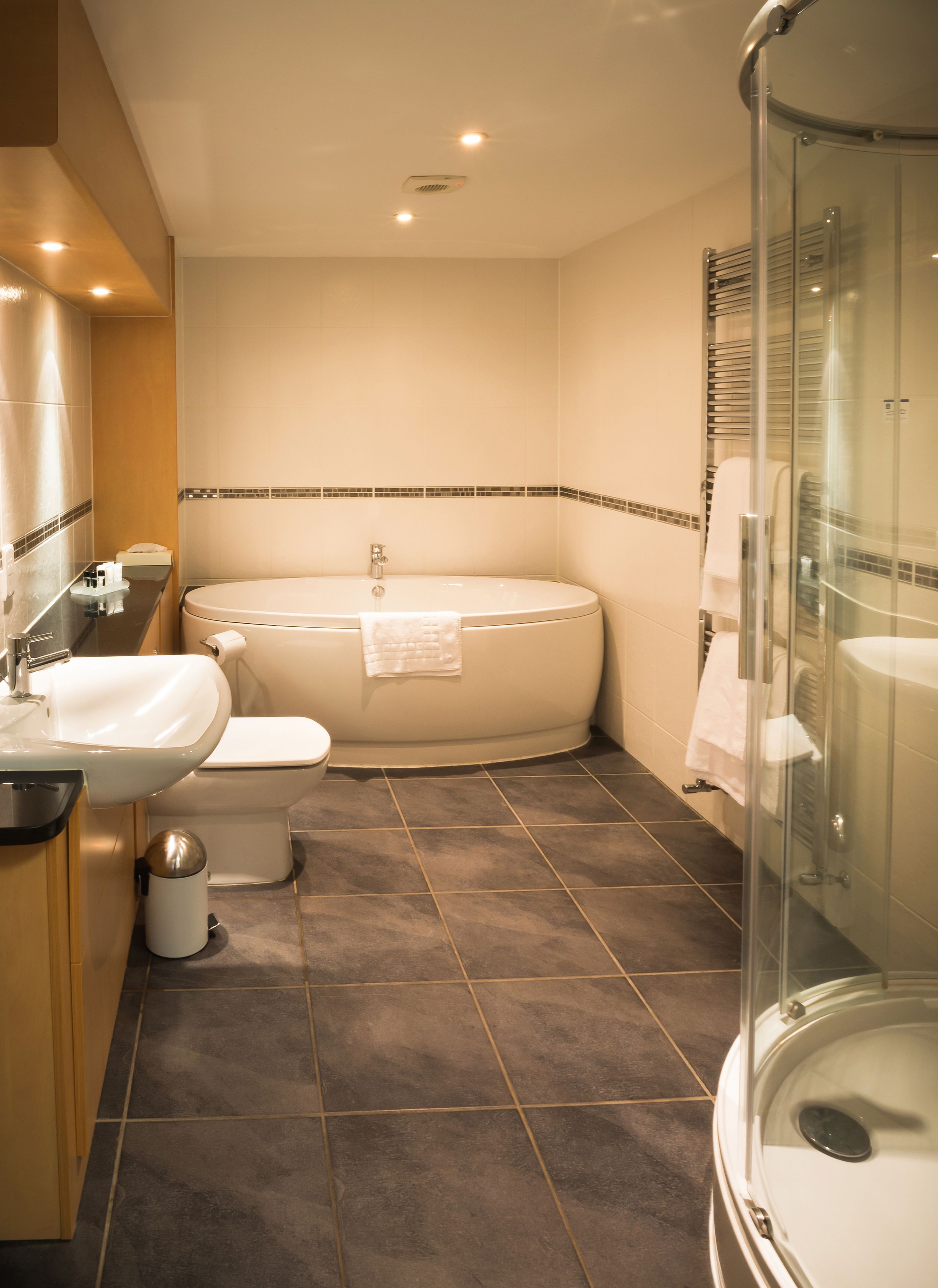 suite, 1 king bed, non smoking | bathroom | shower, hair dryer, towels