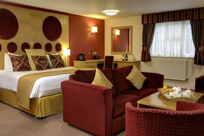 Suite, 1 King Bed, Non Smoking | Bathroom | Shower, hair dryer, towels