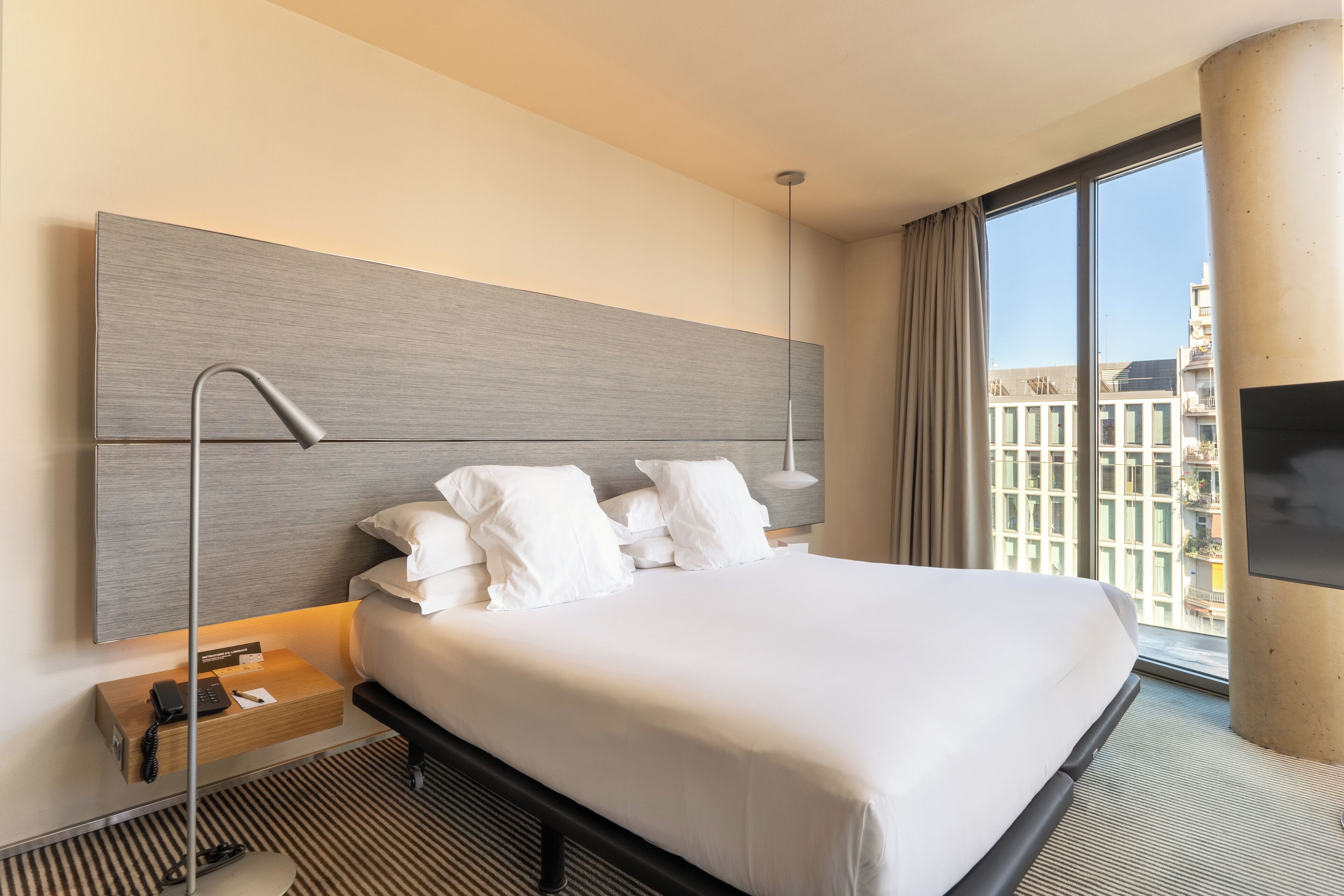 deluxe room | premium bedding, minibar, in-room safe, desk