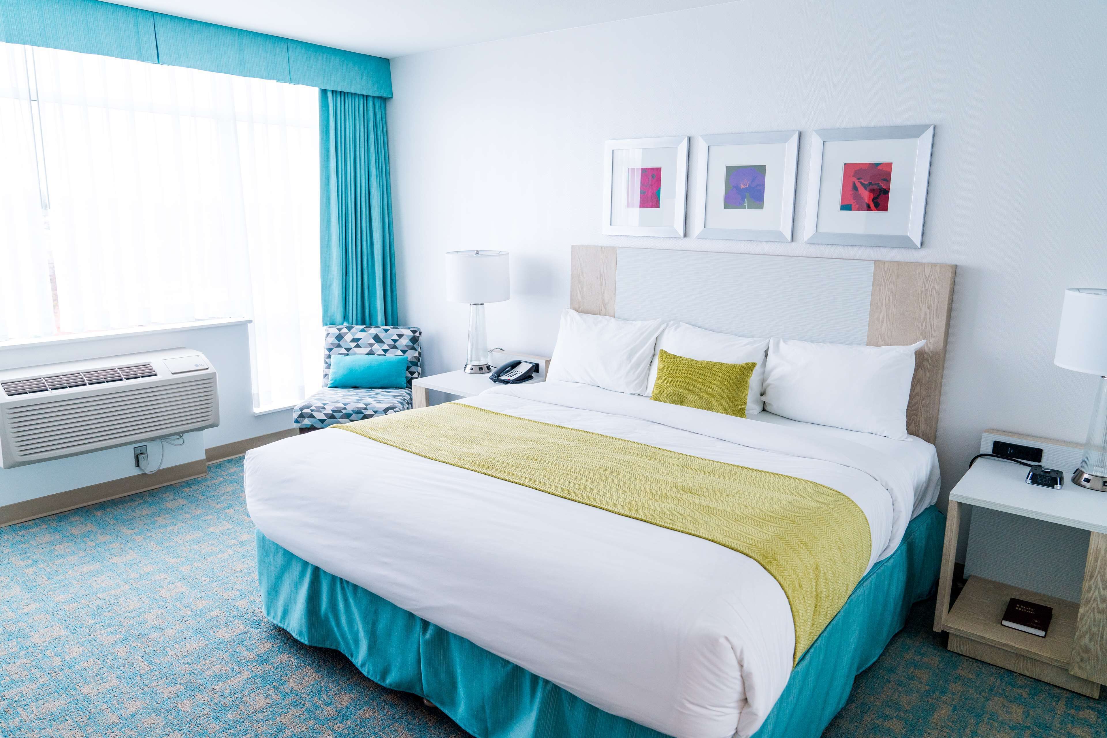 premium bedding, desk, blackout curtains, iron/ironing board