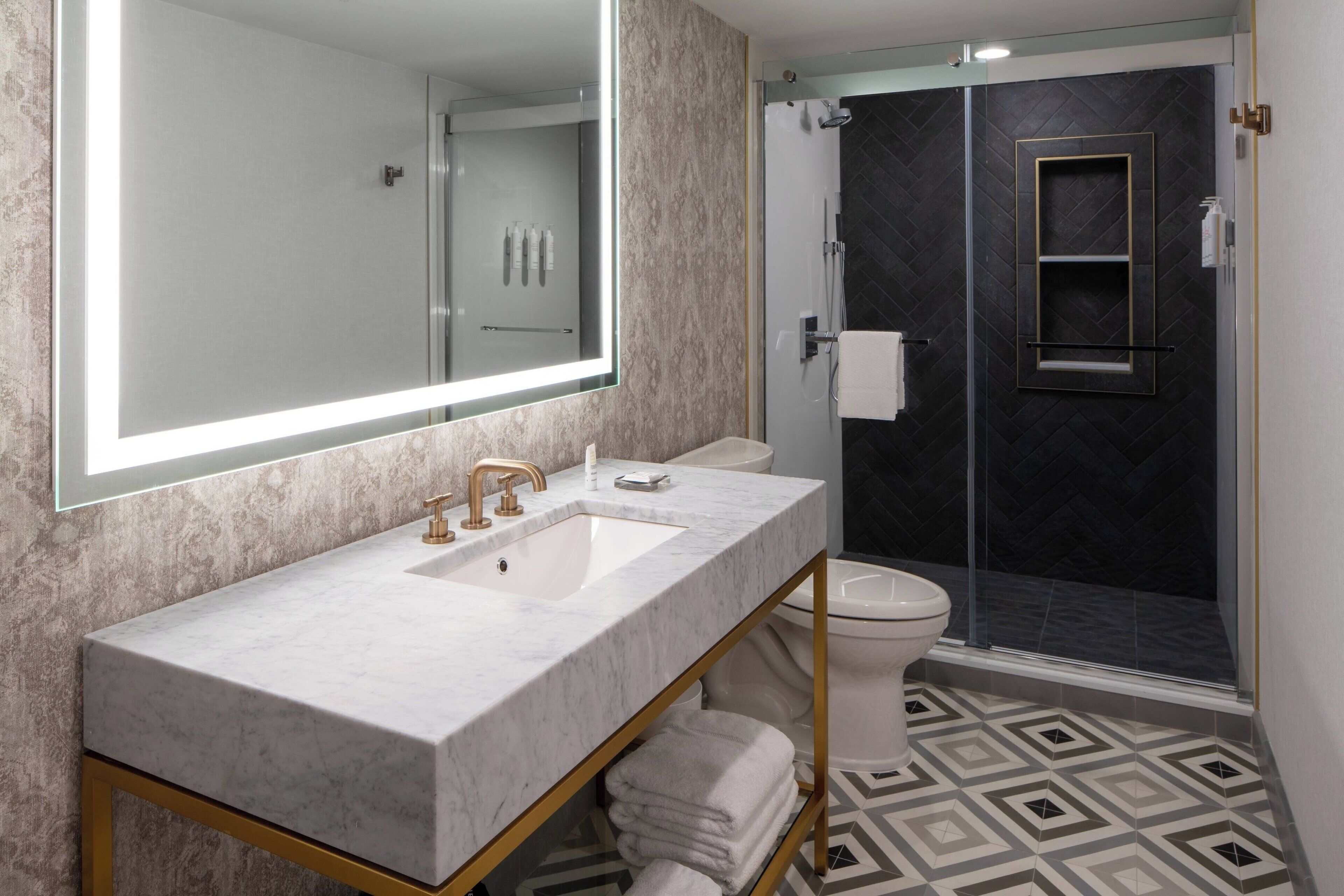 combined shower/bathtub, free toiletries, hair dryer, bathrobes