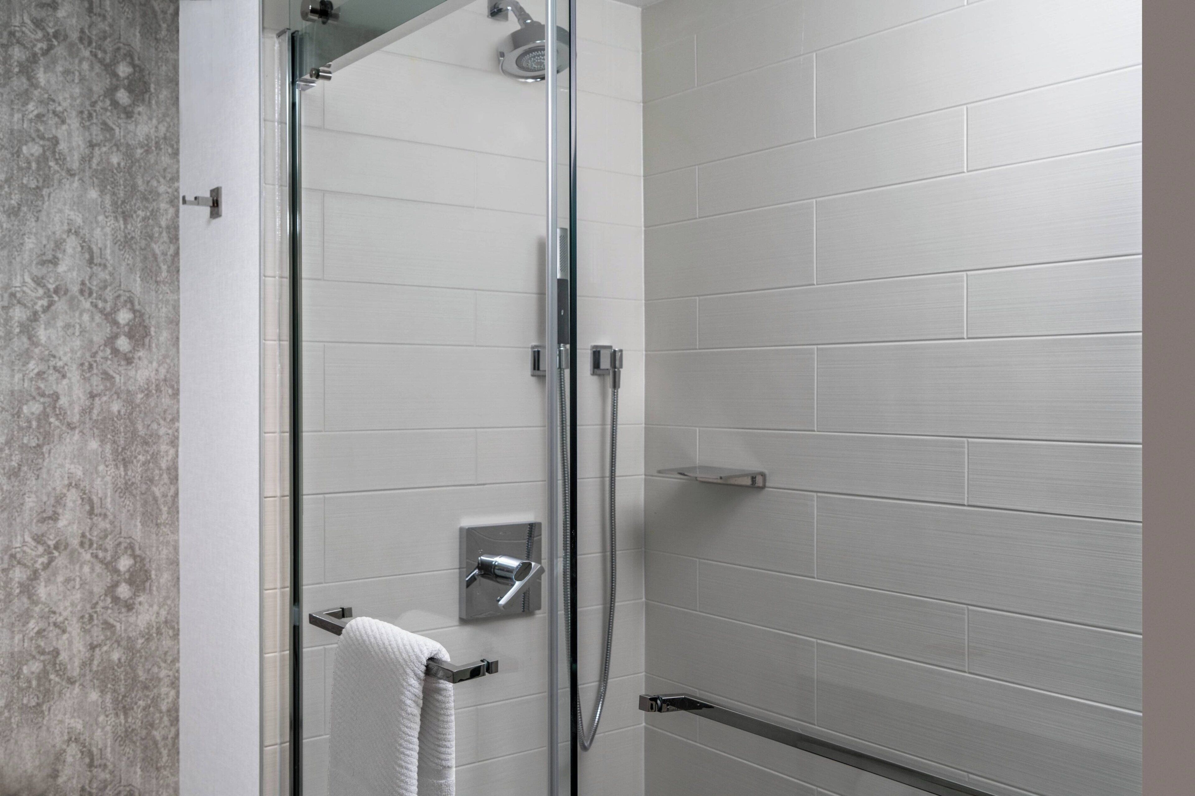 combined shower/bathtub, free toiletries, hair dryer, bathrobes