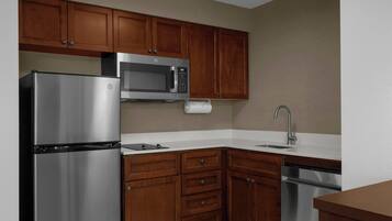 Suite, 1 Bedroom | Private kitchen | Fridge, microwave, stovetop, dishwasher