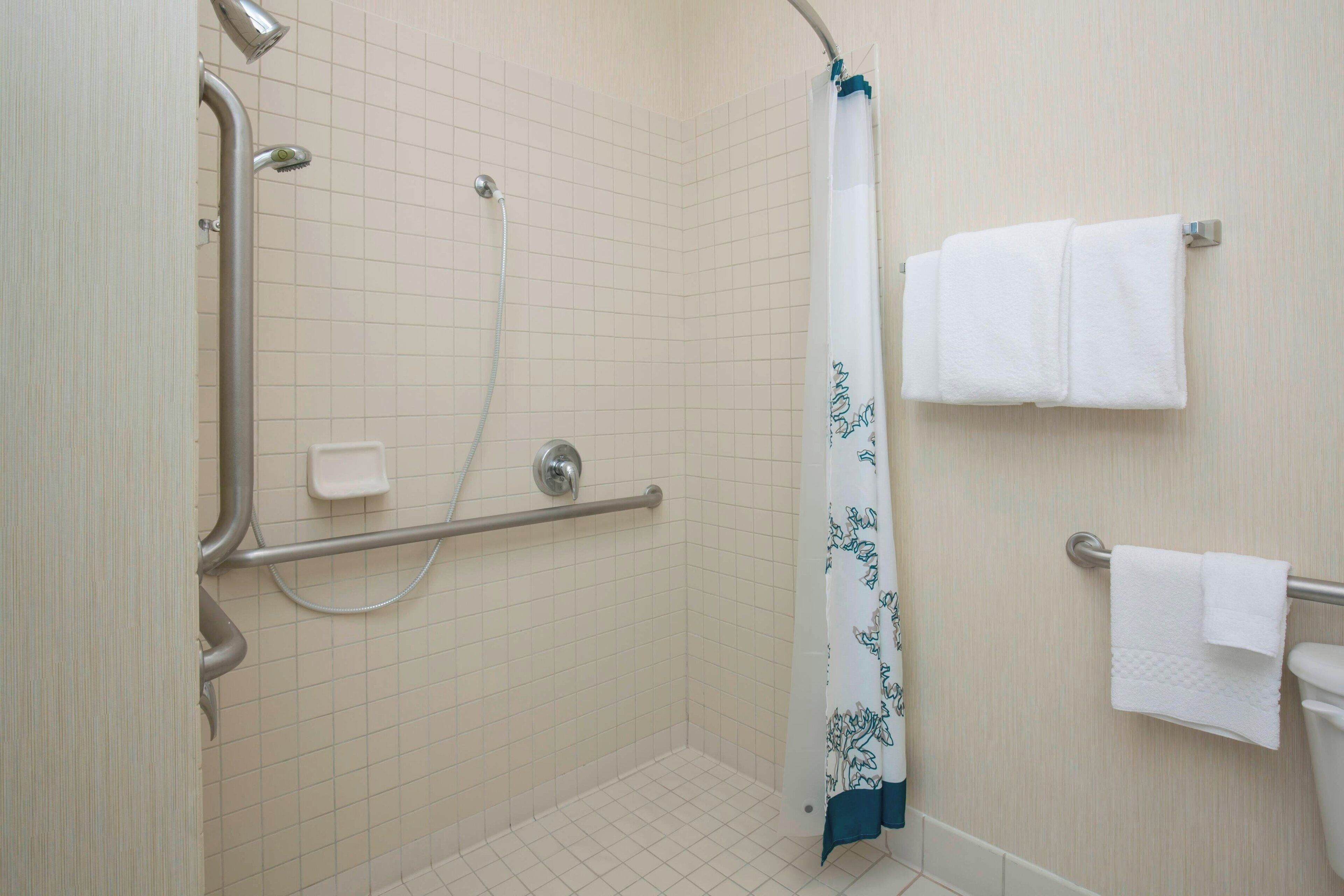 combined shower/bathtub, free toiletries, hair dryer, towels