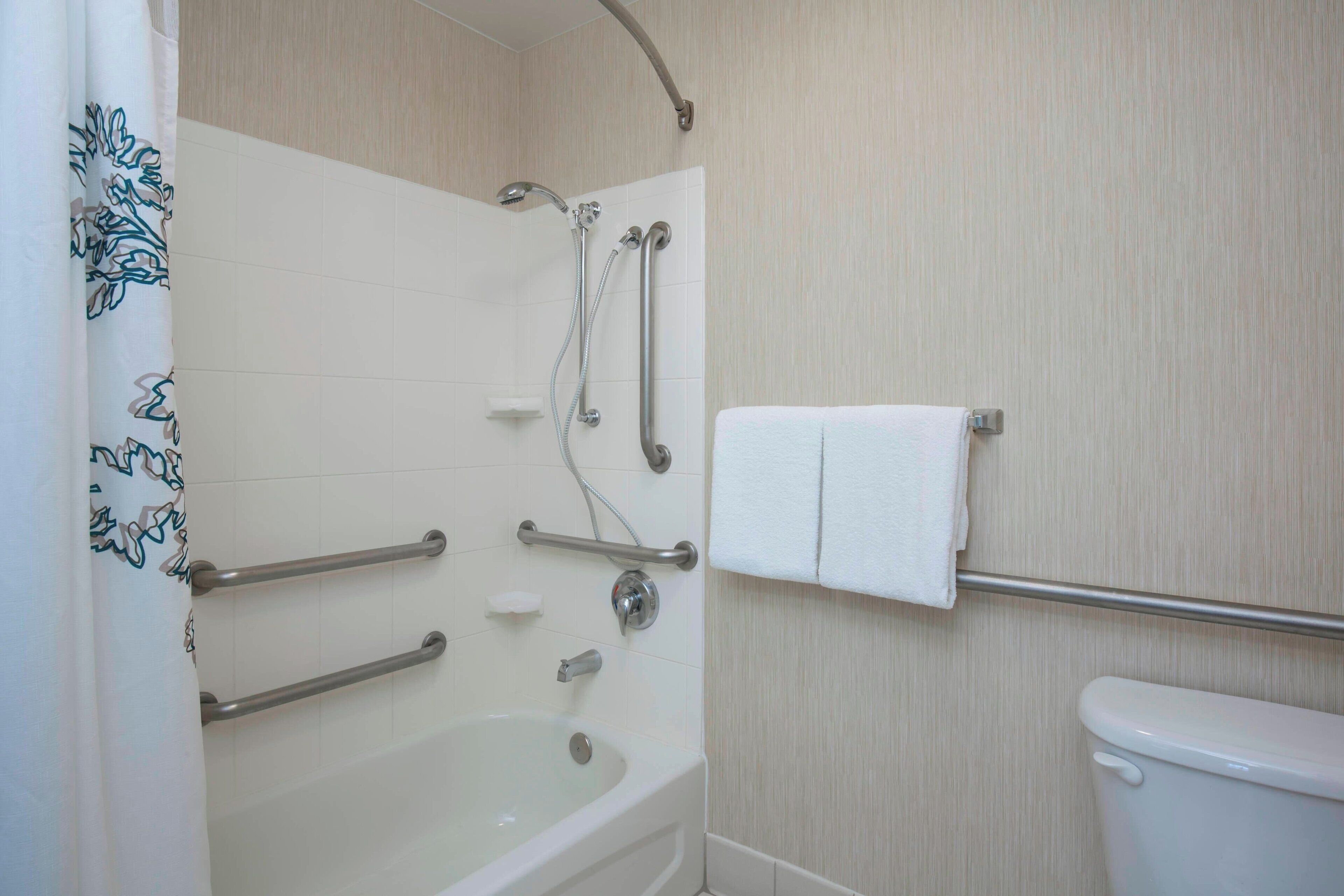 combined shower/bathtub, free toiletries, hair dryer, towels