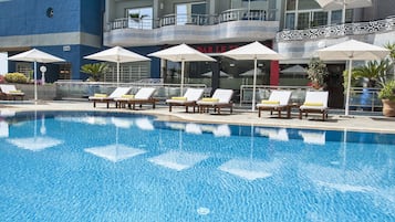 Outdoor pool, pool umbrellas, pool loungers