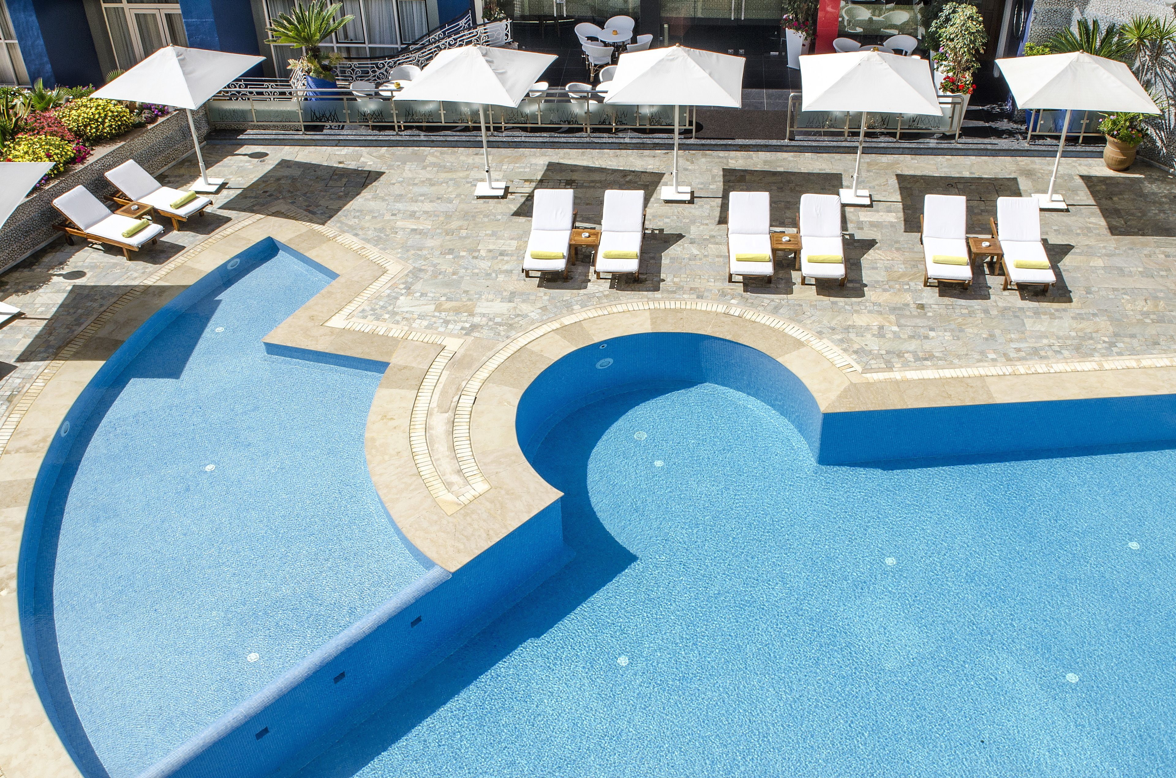 Outdoor pool, pool umbrellas, pool loungers