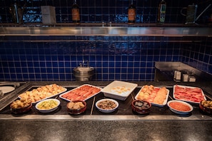 Daily cooked-to-order breakfast (EUR 15 per person)