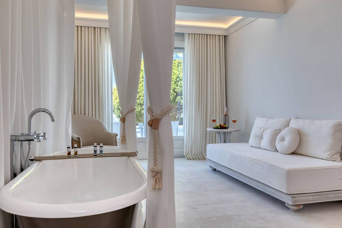 premium aegean room with partial sea view | 1 bedroom, minibar, in-room safe, blackout curtains