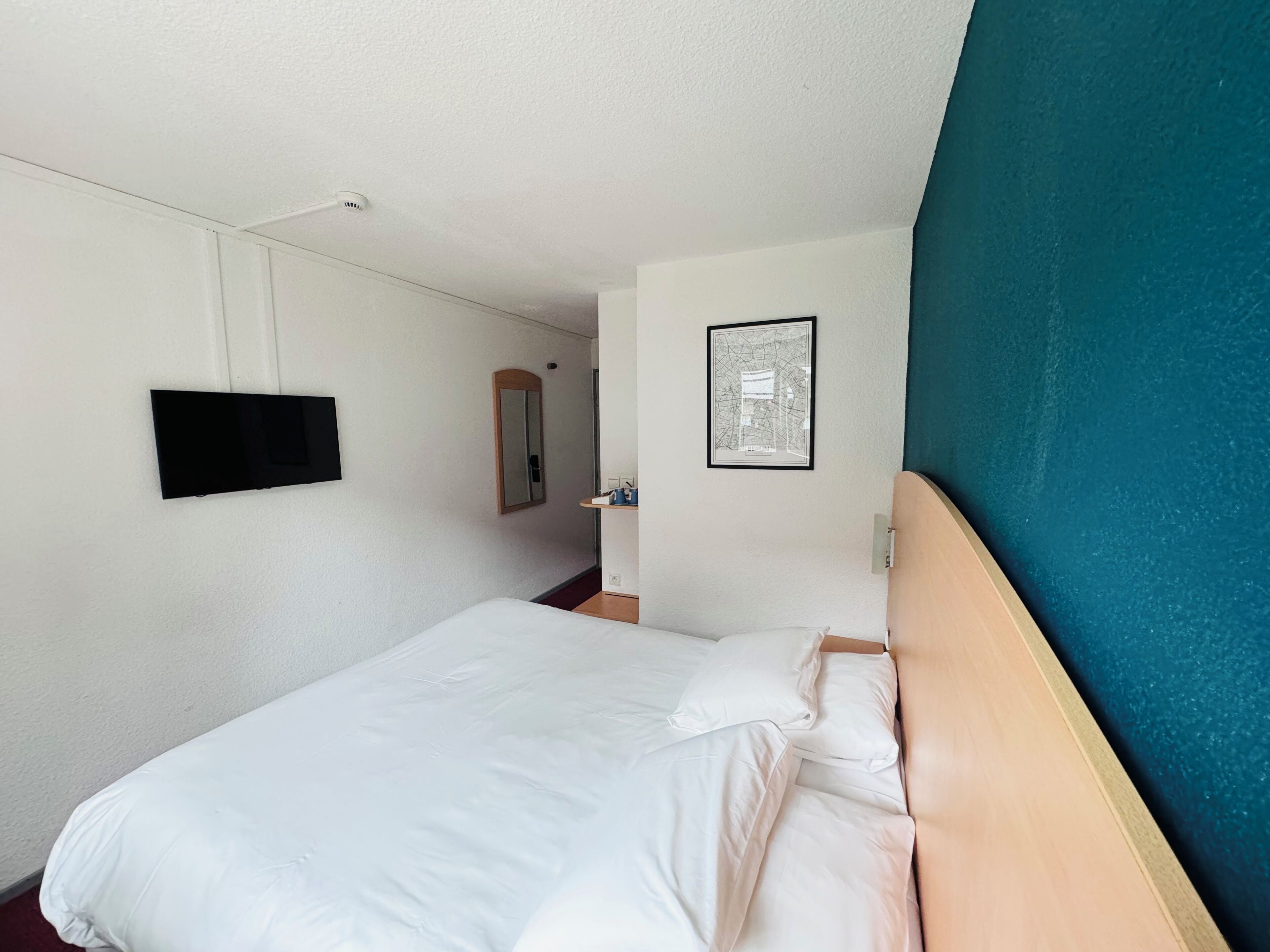 Desk, blackout curtains, iron/ironing board, travel cot