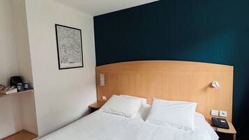 Desk, blackout curtains, iron/ironing board, travel cot