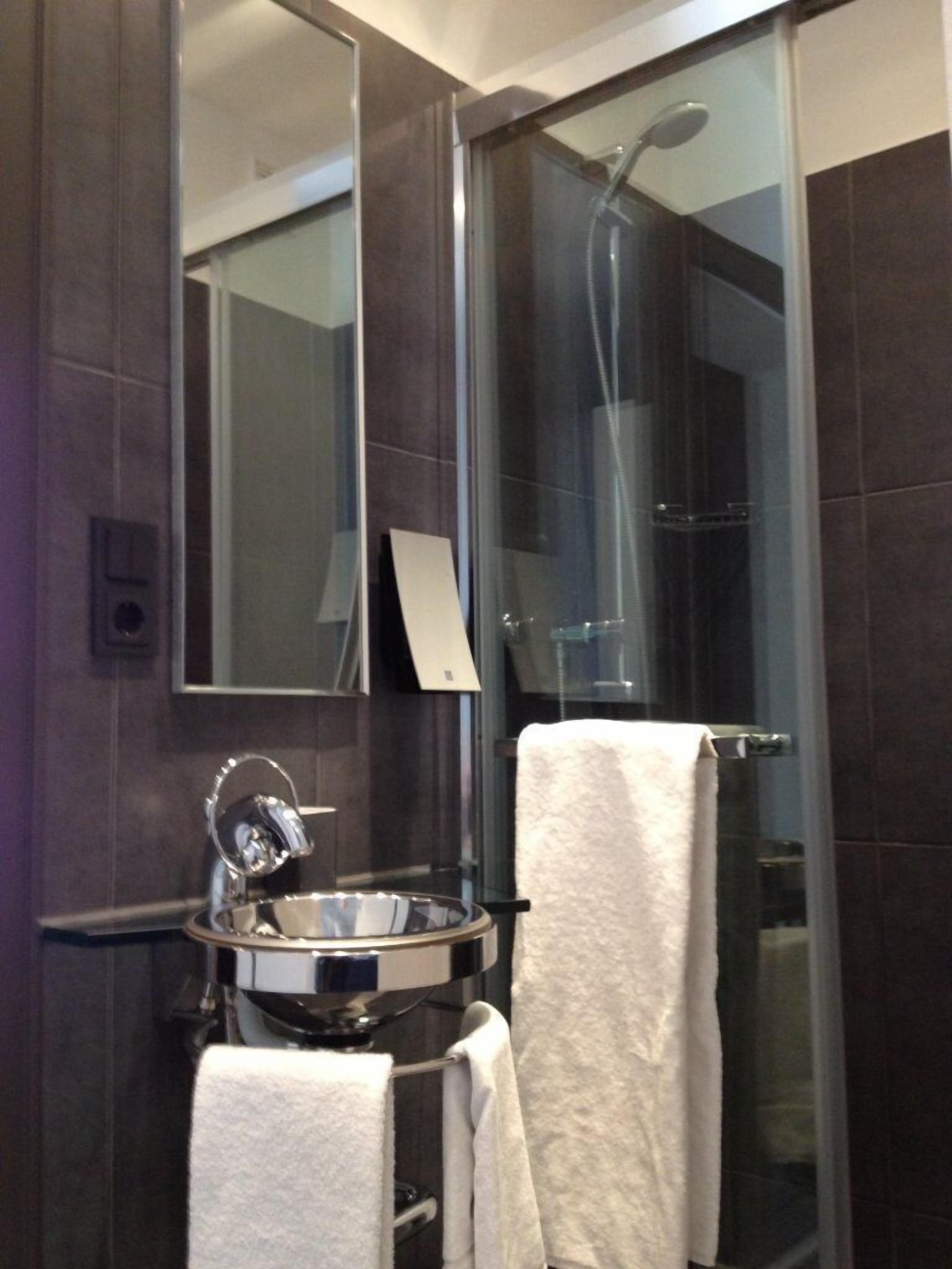 single room | bathroom | hair dryer, towels