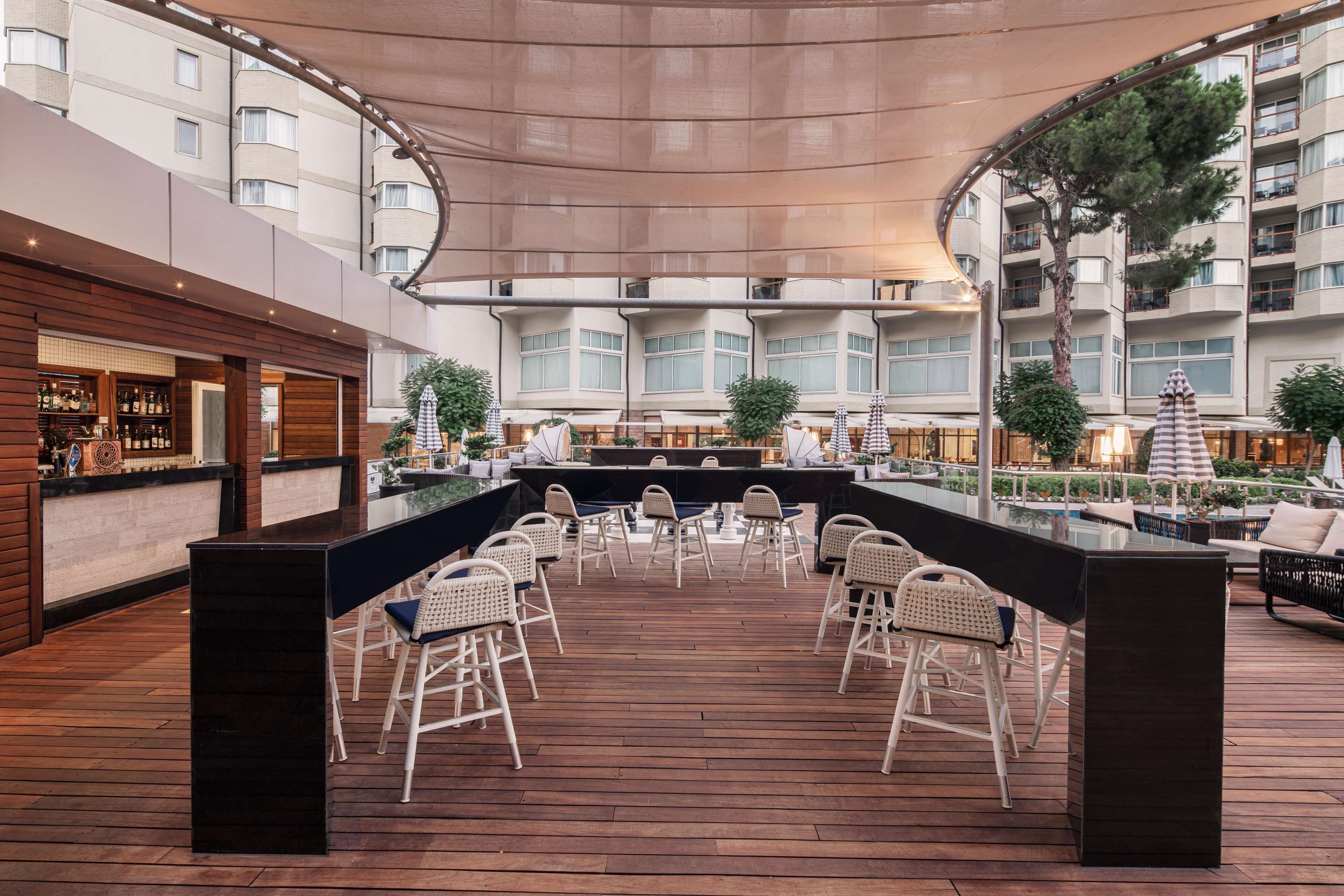 6 bars/lounges, 2 poolside bars, beach bar