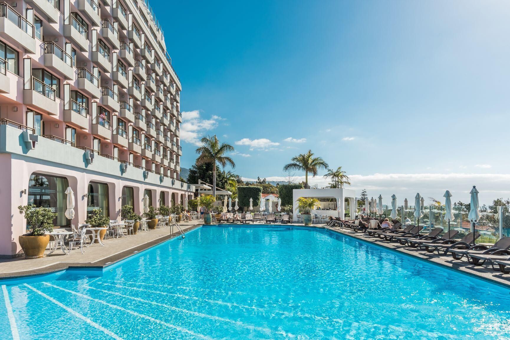 Indoor pool, outdoor pool, pool umbrellas, sun loungers