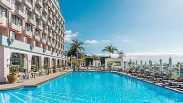 Indoor pool, outdoor pool, pool umbrellas, sun loungers