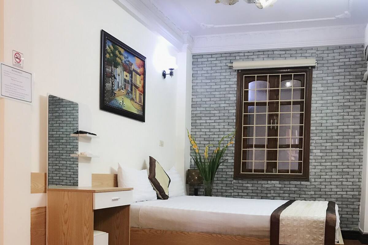 Superior Double Room | Living area | 50-inch flat-screen TV with cable channels, TV