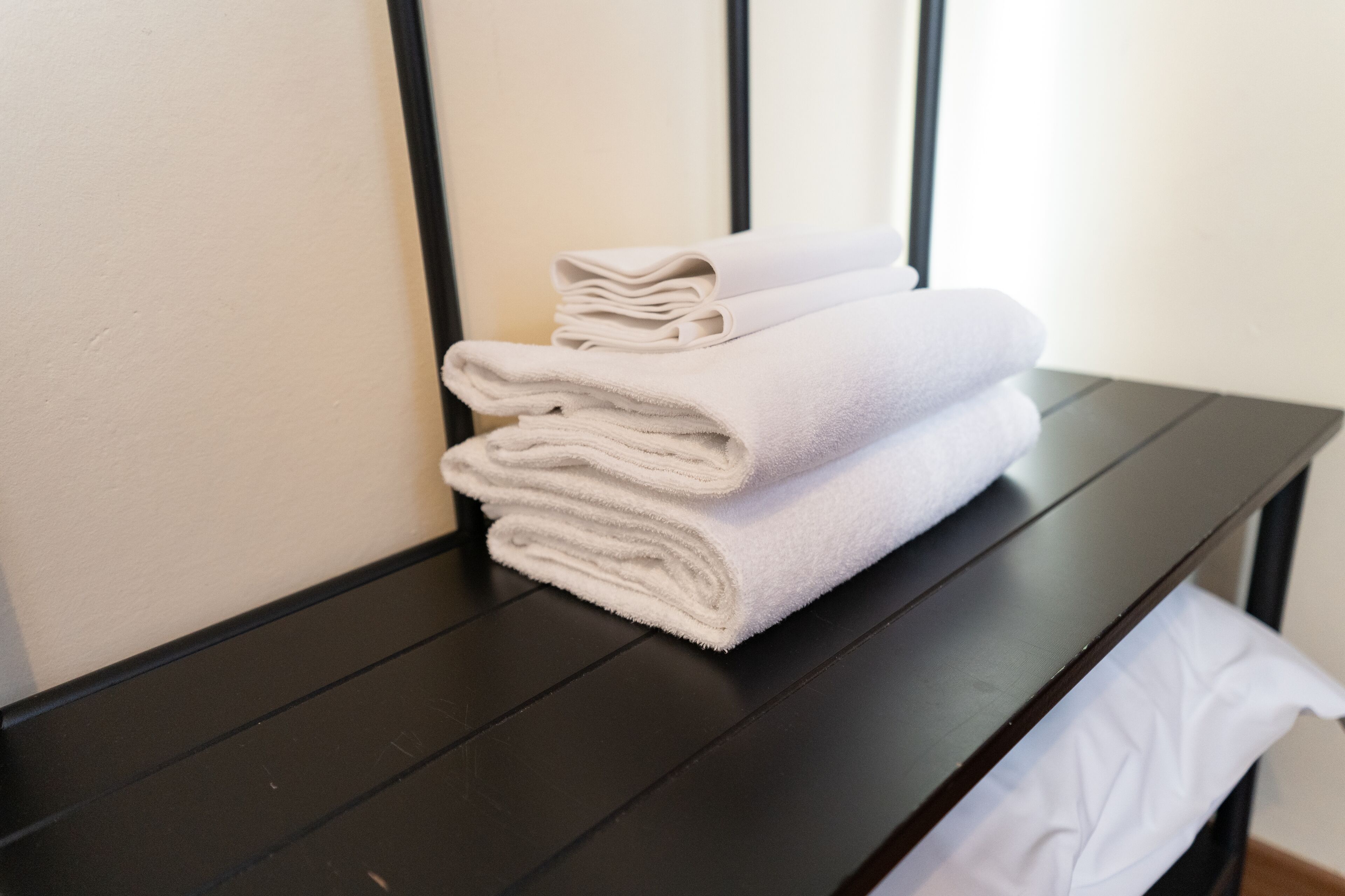 economy twin room, 2 single beds, shared bathroom | room amenity