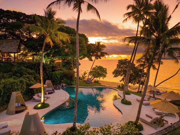 Outdoor pool, free pool cabanas, pool umbrellas