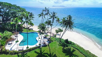 Outdoor pool, free pool cabanas, pool umbrellas