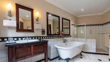 Designer toiletries, hair dryer, towels