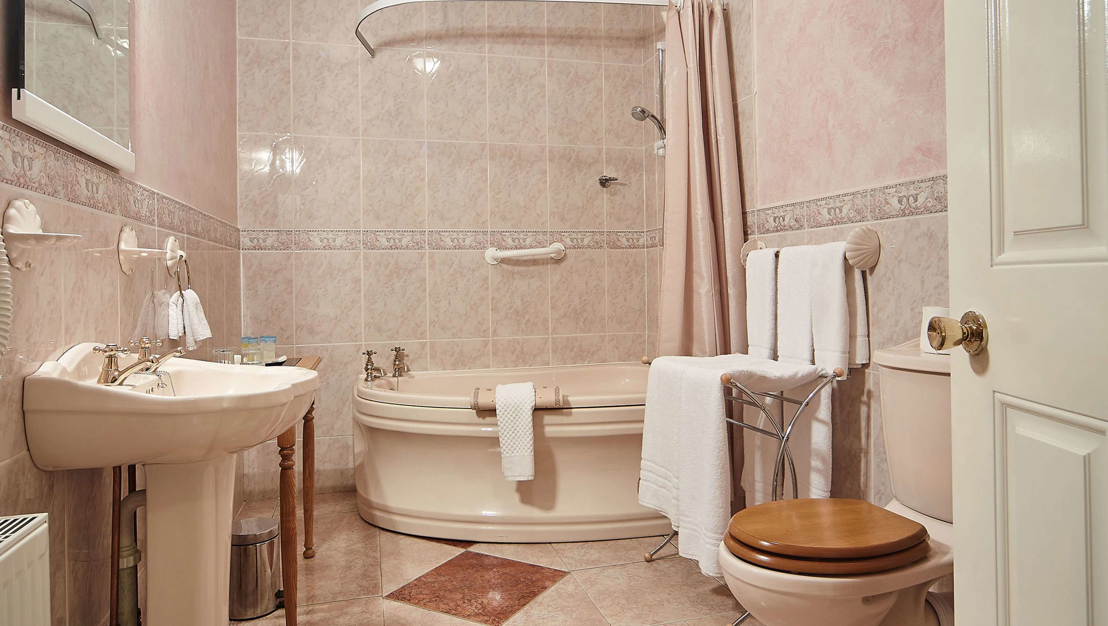 combined shower/bathtub, free toiletries, hair dryer, bathrobes