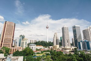 A cityscape with a prominent tower and various high-rise buildings. - Prescott Hotel KL Medan Tuanku (Kuala Lumpur)