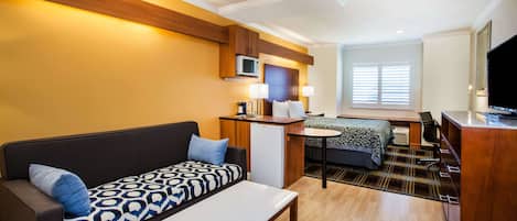 Suite, 1 Queen Bed, Non Smoking | 1 bedroom, desk, laptop workspace, iron/ironing board
