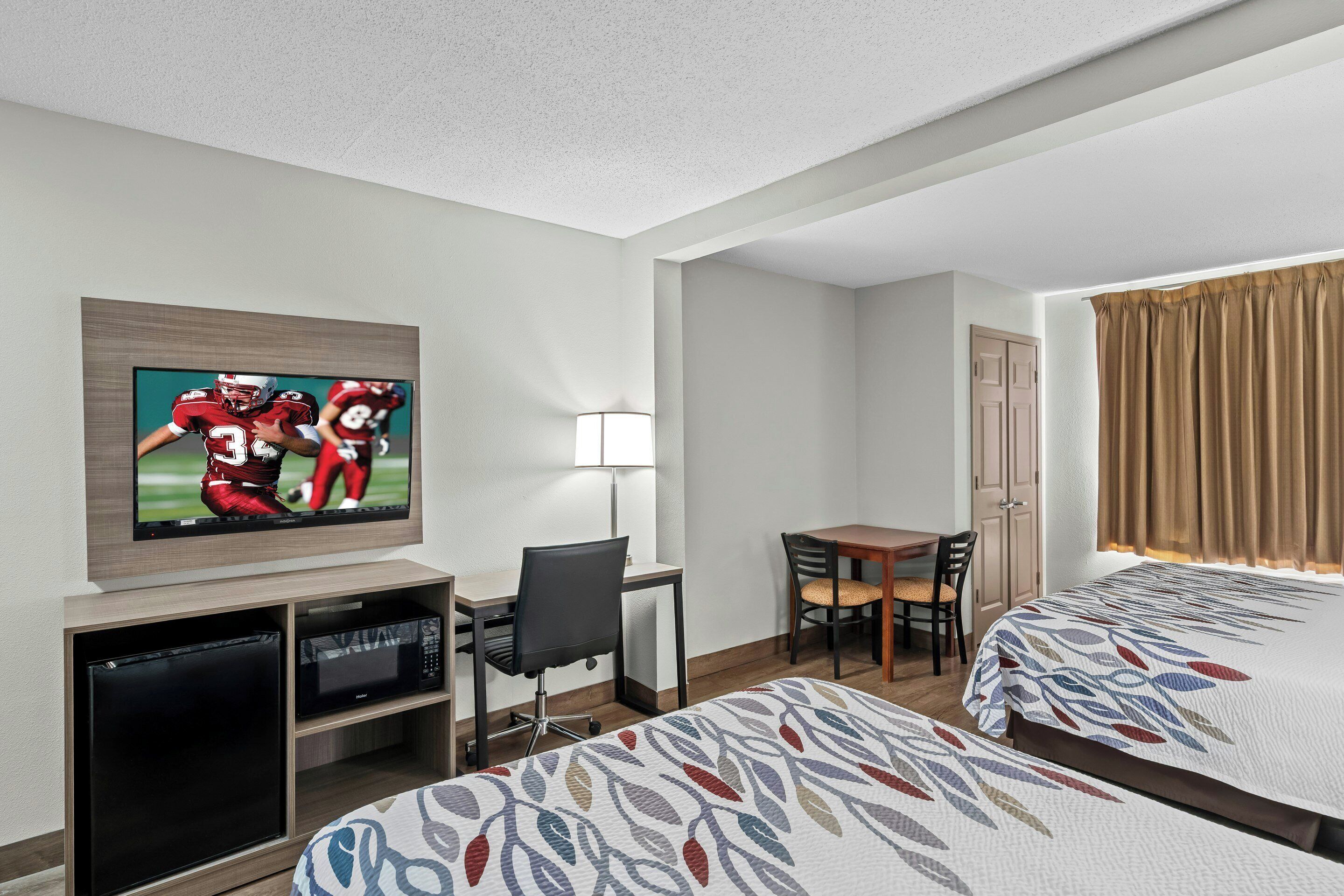 Blackout drapes, iron/ironing board, WiFi (free), alarm clocks