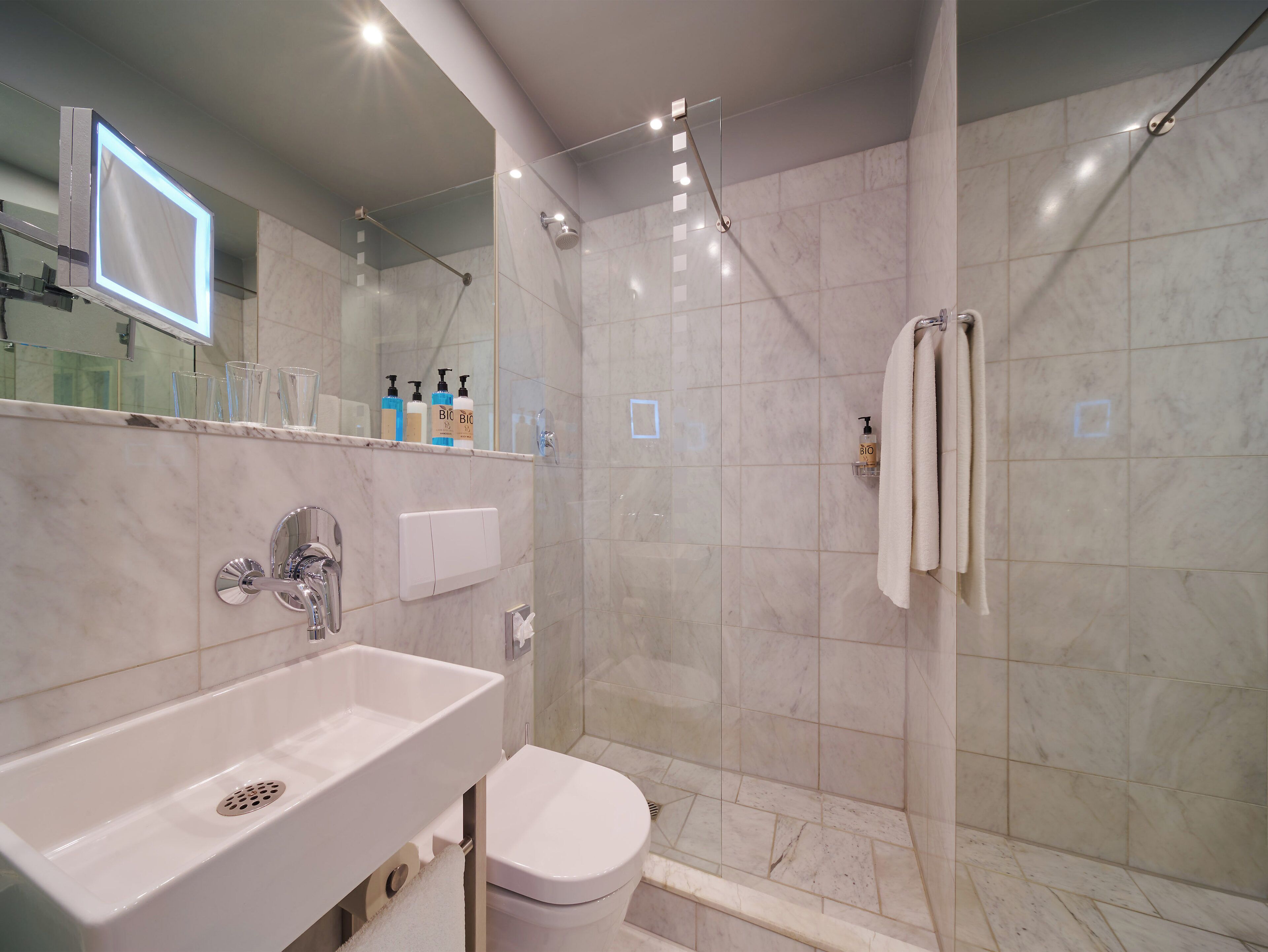 eco-friendly toiletries, hair dryer, heated floors, towels