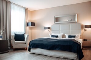 Coffres-forts dans les chambres, bureau, fer et planche à repasser