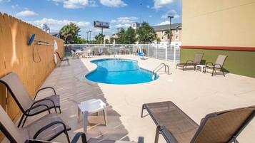 Outdoor pool, open 8:00 AM to 10:00 PM, sun loungers