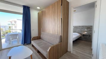 Apartment, 2 Bedrooms | Living area | 32-inch TV with satellite channels