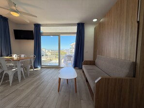 Apartment, 2 Bedrooms | Living area | 32-inch TV with satellite channels - Agi Rescator (Roses)