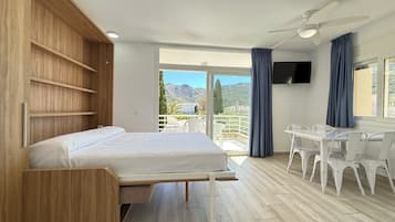 Apartamento habitación superior | Coin séjour | Télévision de 32 pouces avec chaßnes par satellite