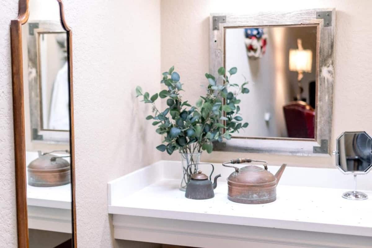 shower, hair dryer, bathrobes, towels