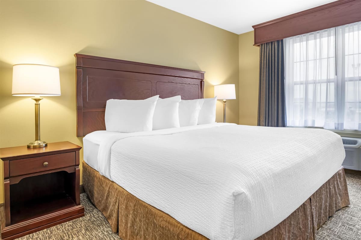 Suite, 1 King Bed, Non Smoking, Jetted Tub | Down duvets, in-room safe, individually decorated