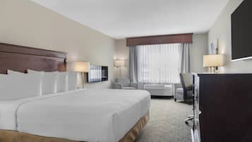 Suite, 1 très grand lit, non-fumeurs, cheminée | Couette en duvet d'oie, coffres-forts dans les chambres