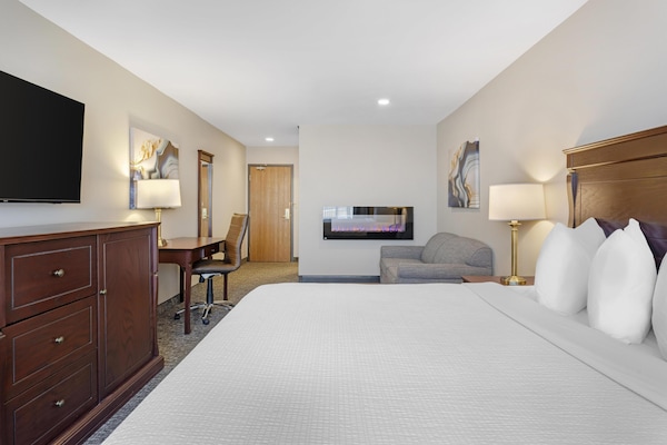 Suite, 1 King Bed, Non Smoking, Fireplace (with Sofabed) | Down comforters, in-room safe, individually decorated