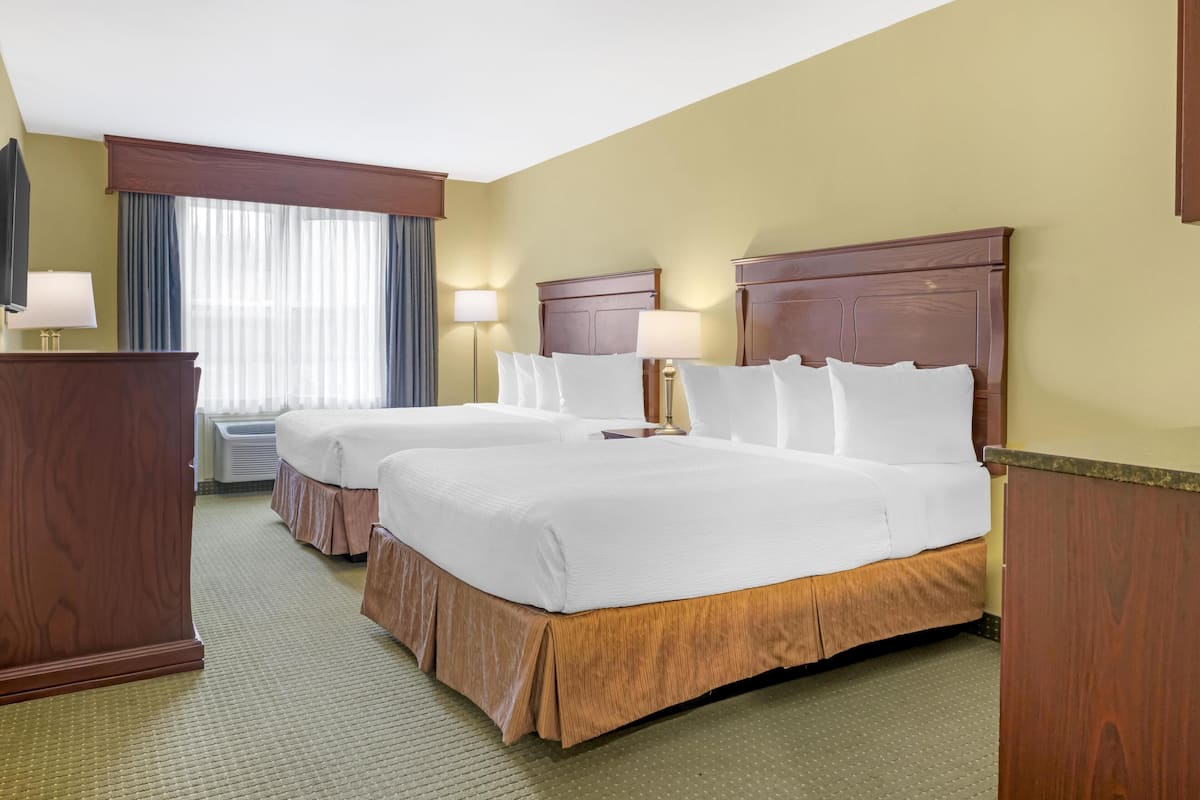 Suite, 2 Queen Beds, Non Smoking, Kitchenette | Down duvets, in-room safe, individually decorated